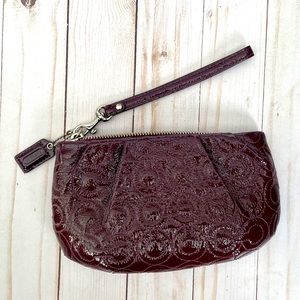 EUC-Coach patent leather embroidered eggplant wristlet
